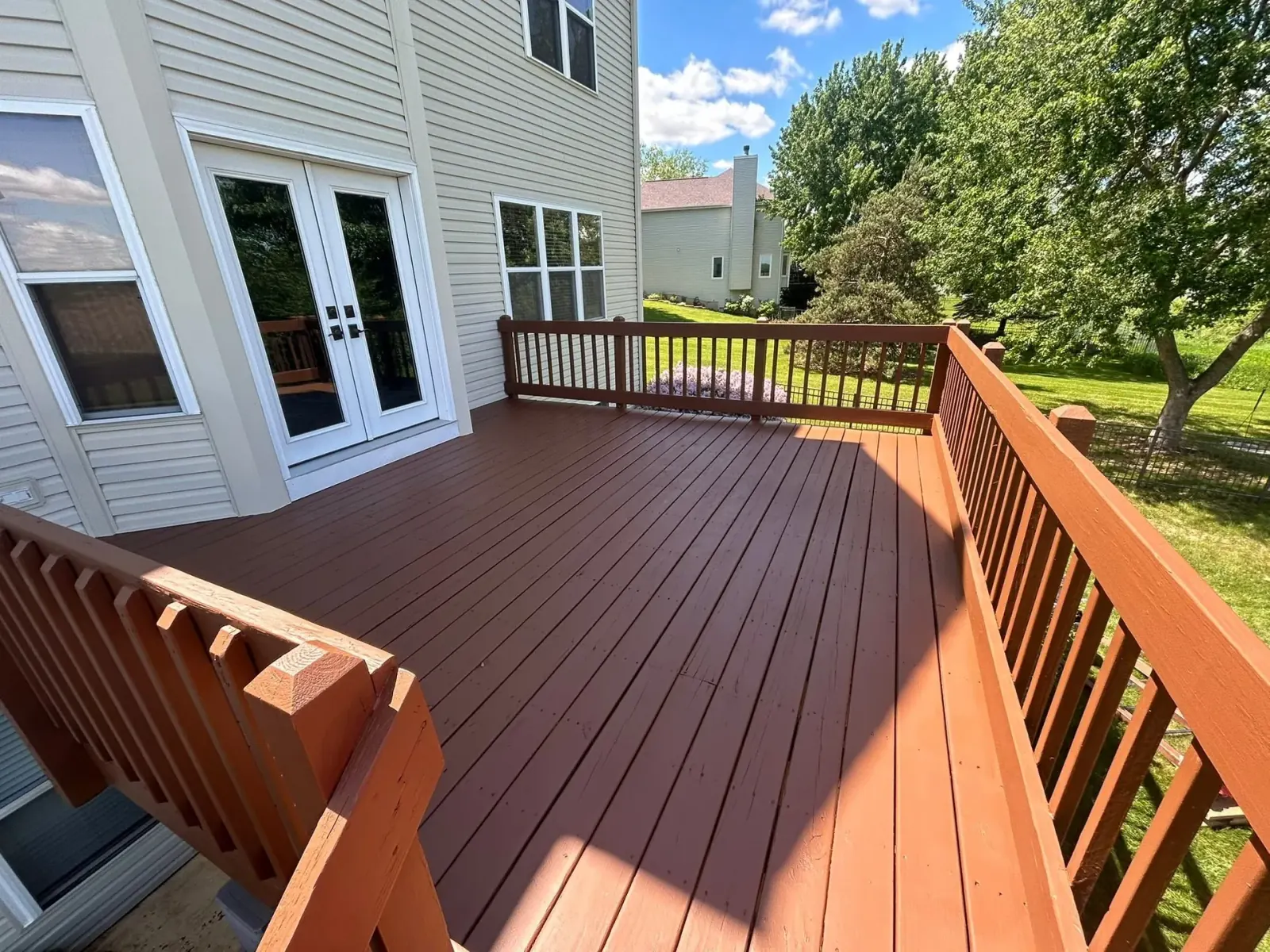 Freshly stained backyard deck